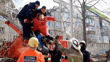 Shells Hit Near Firefighters During Kharkiv Evacuation