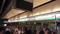 Anti-Government Protesters Disrupt Train Service in Hong Kong