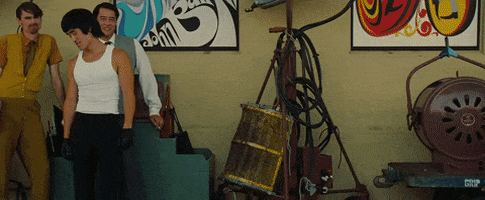 alexanderissac giphygifmaker once upon a time in hollywood bruce lee thrown into car cliff booth GIF