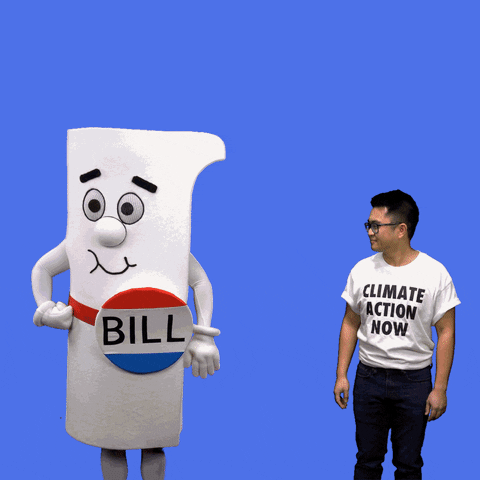 Digital art gif. Person in a life-size costume designed to look like a rolled-up piece of paper with a pin on it that says "Bill," high-fives a man wearing a t-shirt that says "Climate action now." A blue and yellow spiky shape appears over the two, with text inside that reads "Fight climate change together," everything against a blue background.