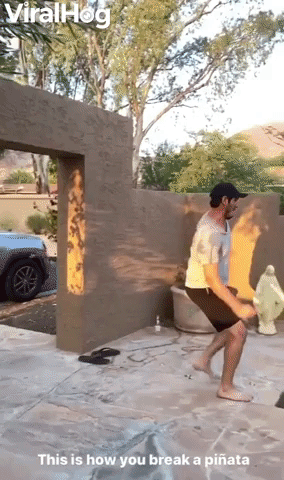 Dude Stylishly Takes Out Piñata