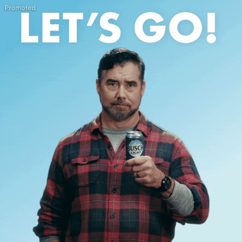 Sponsored gif. Gerald Downey in a red and black plaid shirt makes a strong fist and bicep at us, looking totally amped as he says the words that appear on screen, "Let's go!"