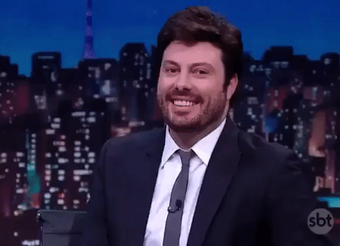 reaÃ§Ã£o engraÃ§a danilo gentili no programa the noite GIF