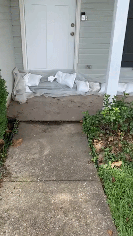 Baton Rouge Resident Prepares for Flooding Ahead of Hurricane Ida's Landfall