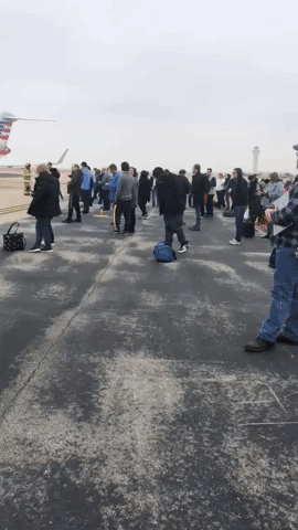Smoke in Plane Forces Passengers to Exit Onto Runway in Dallas