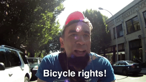 Image in a post titled 'urban cycling attire: how to weatherproof your style? (must-know tips)' | giphy | fixed gear focus Bikers rights gif via giphy