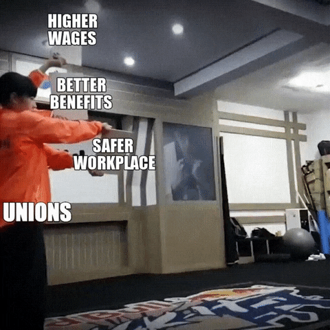 Meme gif. Two men wearing orange jackets hold out small pieces of drywall in front of a third man, who takes a running leap and kicks three of the pieces clean out of the air. The two men are labeled "unions," the kicking man is labeled "Amazon workers," and the pieces of drywall are labeled, "Safer workplace," "Better benefits," and "higher wages."