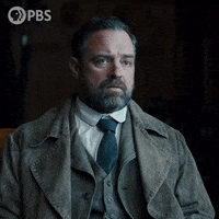 TV gif. Oskar Rheinhardt as Juergen Maurer in "Vienna Blood" wears a faded jacket suit and tie nods his head in reluctant agreement, then stands up to leave. Text, "Mm."