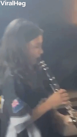 Baby Sister Confused By Clarinet