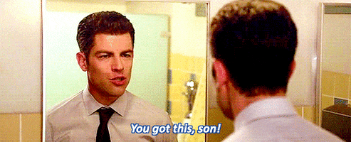 TV gif. Wearing a white shirt and tie, Max Greenfield as Schmidt from New Girl aggressively psyches himself up in the bathroom mirror. Text, "You got this, son!"