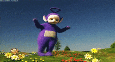 TV gif. Tinky Winky the purple Teletubby, dances among flowers as it cheerfully kicks its purple legs out to the side. 