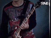 Rock Reaction GIF by Travis