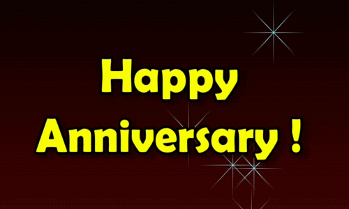Text gif. Sparkles fly around the screen as hearts twirl. Bold text reads, "Happy anniversary."