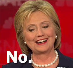 Political gif. Hillary Clinton shakes her head decisively and smiles as she says, "No."