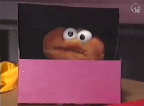 Video gif. A googly-eyed donut puppet peeks out of a pastry box to say: Text, "Hey, that's good!"