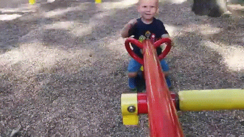 toddler teeter GIF