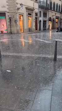 Tourists Shelter From Heavy Hail as Cloudburst Hits Florence