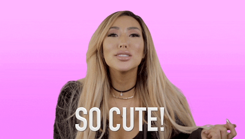 Celebrity gif. Smiling Youtuber Arika Sato leans towards us and says, “So cute!”