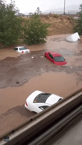 Cars Submerged in Parking Lot After Flash Flooding Hits Cedar City, Utah