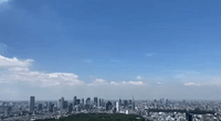 Air Force Practices Skywriting Olympic Rings Over Tokyo Ahead of Opening Ceremony