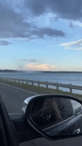 'It's Getting Bigger': Driver Witnesses Waterspout Formation in Decatur, Alabama
