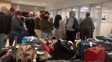 Passengers Face Long Delays at Airport