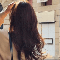 Lady M Hair Flip GIF