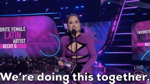 Celebrity gif. Becky G at the American Music Awards 2021, receiving an award for Favorite Female Latin Artist, saying, "we're doing this together."