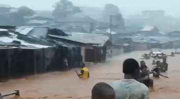 Families Flee as Floodwaters Rise in Sierra Leone's Capital