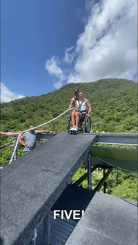 Man With Paraplegia Bungee Jumps in Wheelchair