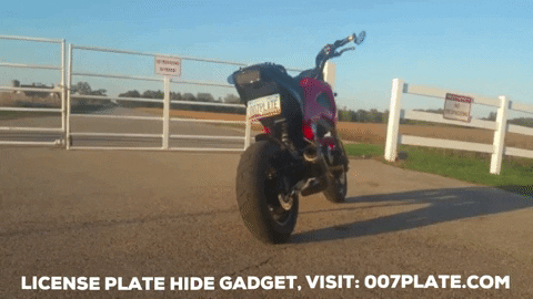 trydeal giphygifmaker cool motorcycle james bond GIF
