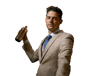 Sponsored sticker gif. Traitors cast member Wells Adams confidently shakes a drink mixer back and forth.
