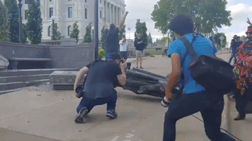 Protesters Topple Christopher Columbus Statue Outside Minnesota State Capitol