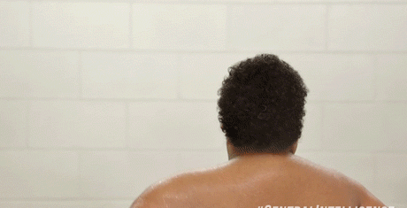 Movie gif. Dwayne Johnson as a younger version of his character Bob in the movie Central Intelligence, dancing like a diva in the shower.