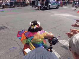 Tammy Duckworth Rides in Chicago Pride Parade Bedecked in Rainbow Colors