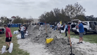 Locals Fill Sandbags as Tropical Storm Nicole Barrels Towards Florida