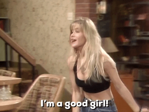 TV gif. Christina Applegate as Kelly in Married with Children. She walks up to someone endearingly and knowingly as she says, "I'm a good girl!"
