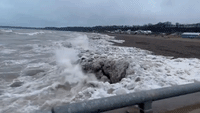 Large Waves Crash on Icy Shores in Ontario's Port Stanley