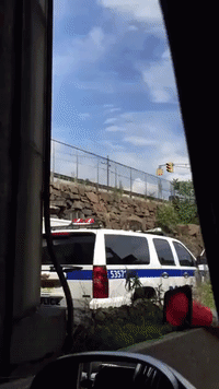 Traffic Stalls as Garbage Truck Crashes Onto Freeway Near Lincoln Tunnel