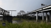 Lightning Strikes Distinctive Memphis Bridge as Cold Front Ends Heat Wave