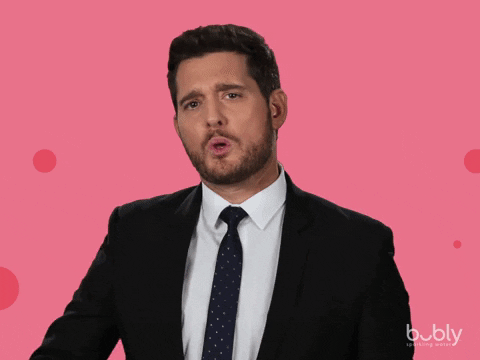 Ad gif. Michael Bublé blows a kiss, and an animated pink heart appears in front of him. Bubly seltzer logo appears in lower right corner.