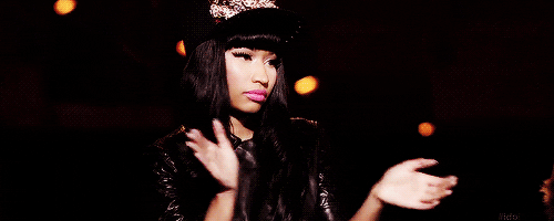 Celebrity gif. Nicki Minaj looks at something seriously and claps her hands. She claps twice then looks down and waves her hand, indicating that that's all to be said.