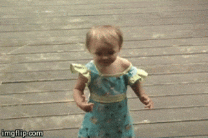 Video gif. Little toddler is wearing a dress and she has her hands out as she declares, "I want my money!"