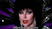 elvira wink GIF
