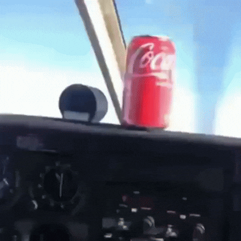Flying Coca Cola GIF
