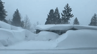 Snow Nearly as High as House's Roof in California's Tahoe Region