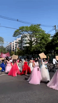 Yangon Women Wear Evening Gowns to March Against Military