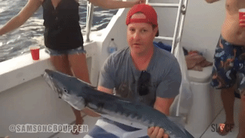 Man Trolls Friend With Barracuda on a Boat