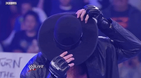 the undertaker reveal GIF by WWE
