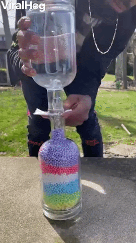 Moving Beads in Glass Bottles